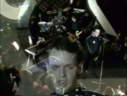 Tubeway Army performing Are 'Friends' Electric? - footage repeated on Top of the Pops, 9 March 1995